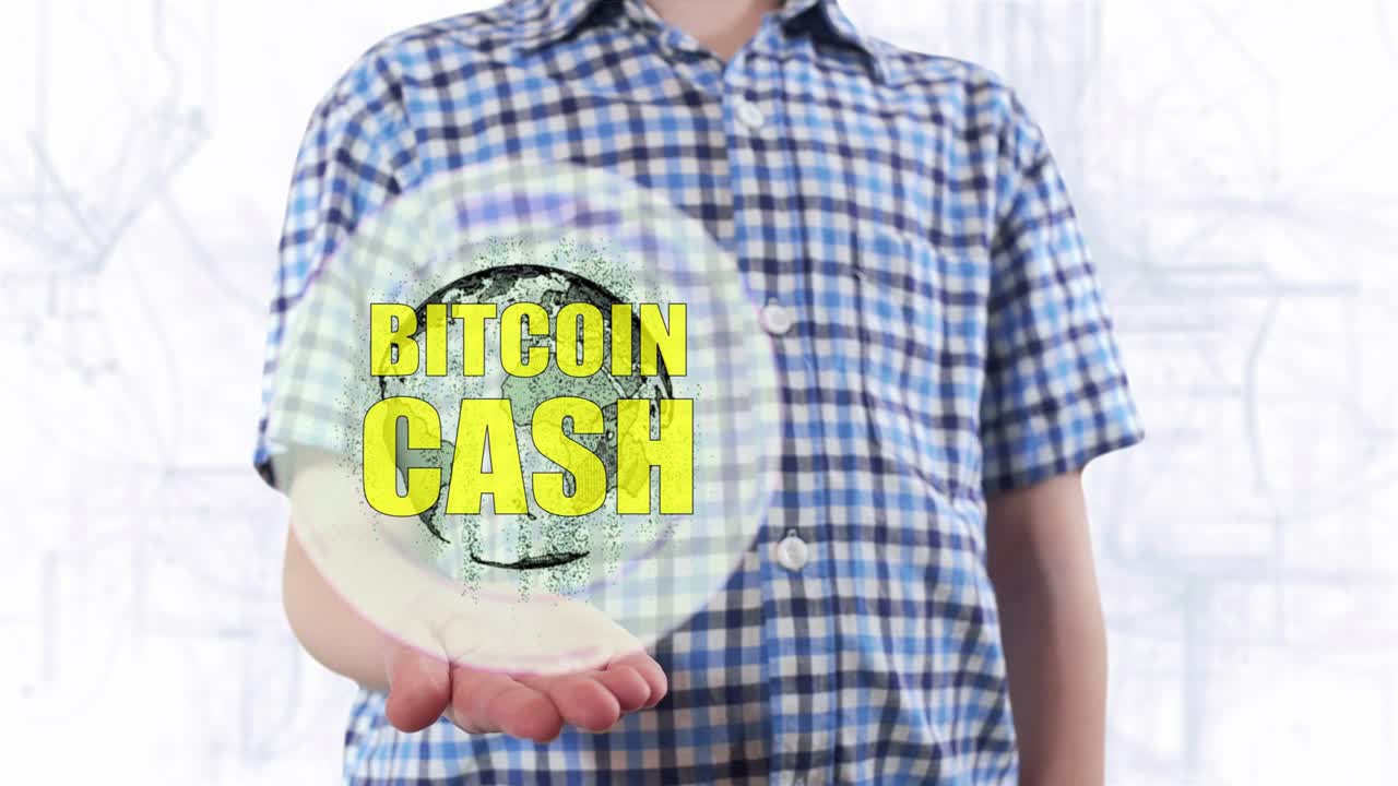 젊은이가 지구의 홀로그램을 보여주고 비트코인 현금을 문자화합니다.