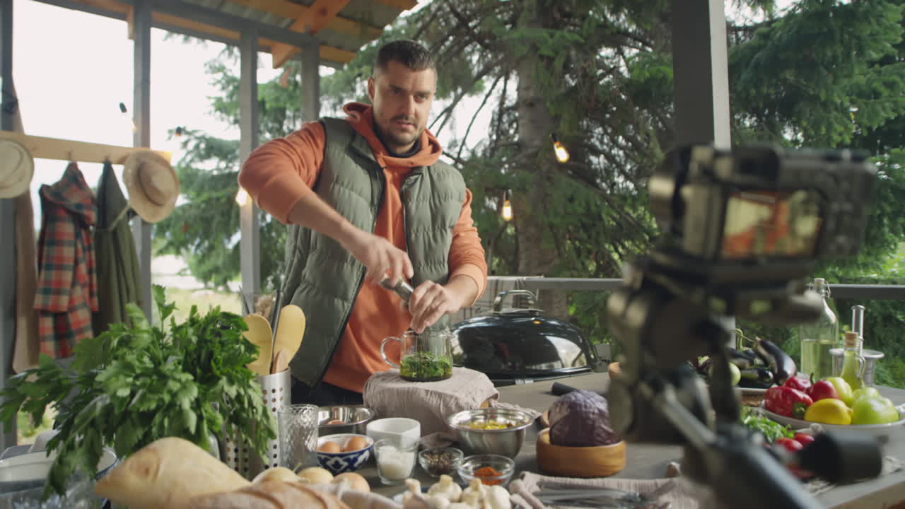 Food Blogger Filming Recipe of Homemade Tea on Terrace