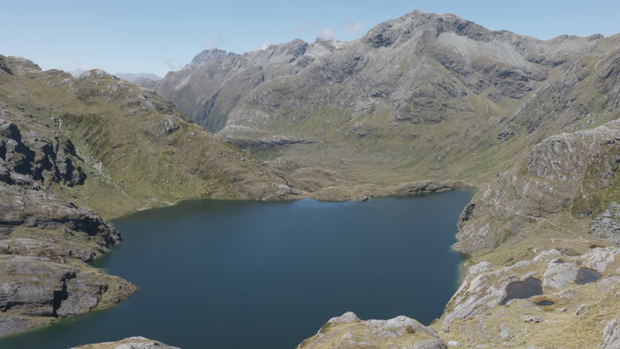 Stunning Aerial View of a Mountain Lake in Fiordland National Park, New Zealand