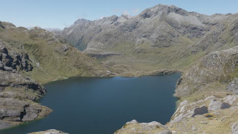 stunning aerial view of a mountain lake in fiordland national park, new zealand