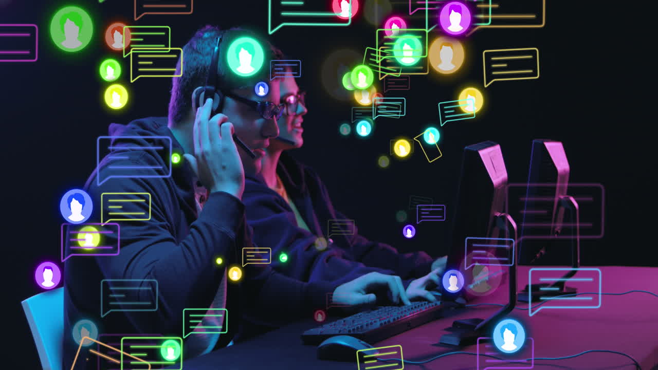 Animation of social media icons and data processing over business people using computers