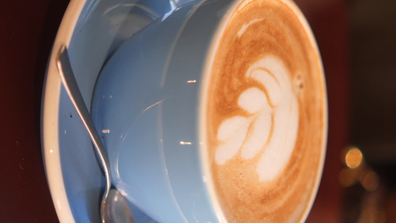 Latte Art in a Blue Cup