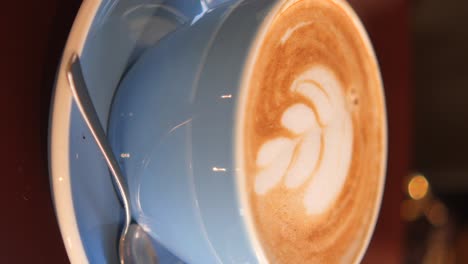 latte art in a blue cup