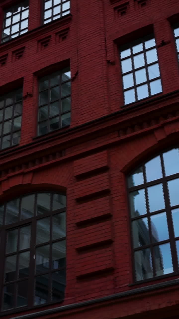 Red Brick Building Facade with Windows