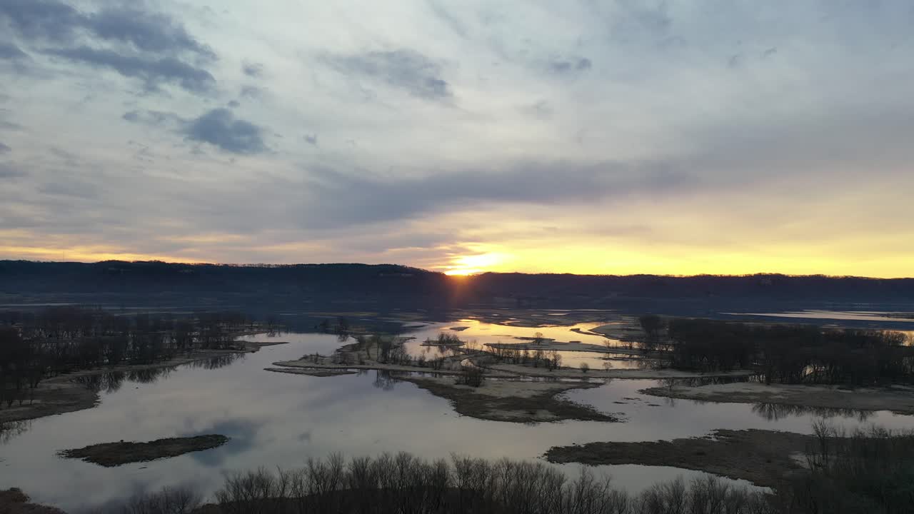Aerial View of River and Wetlands Landscape at Golden Sunset