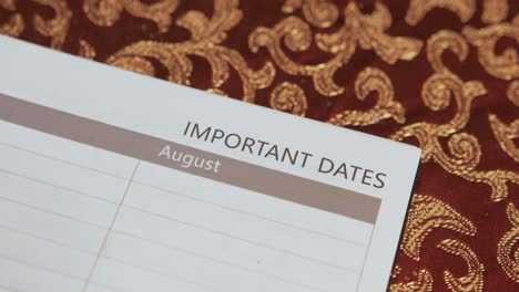 important dates revealing text heading opening notebook