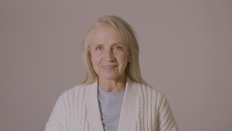 Portrait-Of-A-Senior-Woman-Smiling-At-Camera