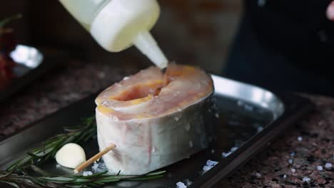 chef preparing a fish fillet