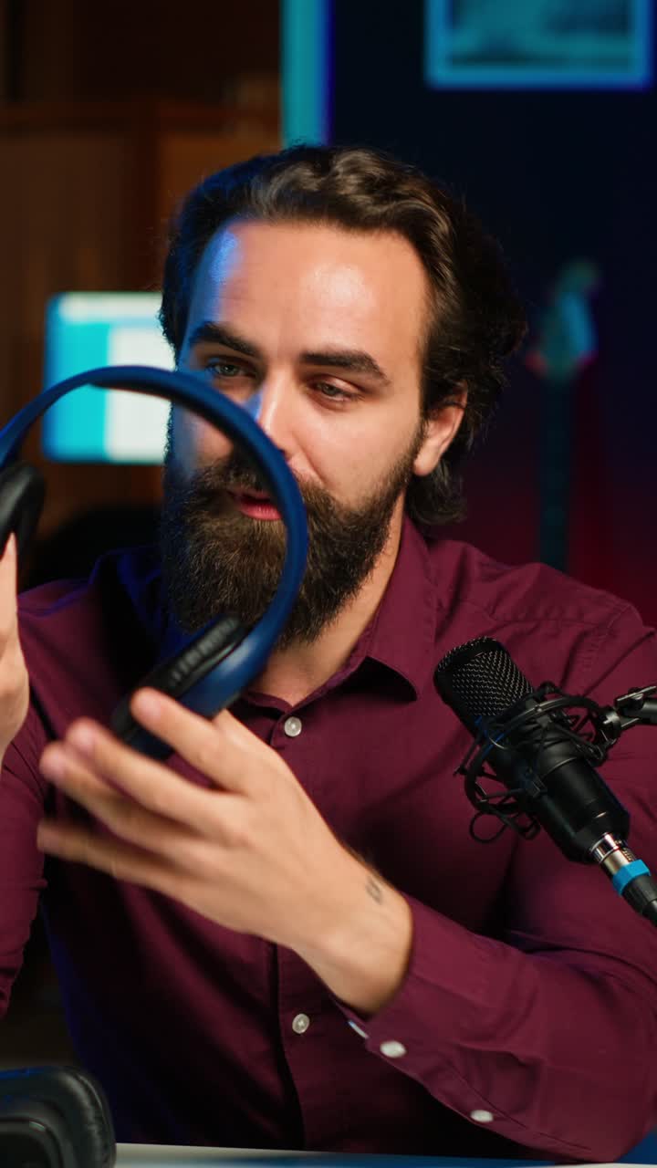 Vertical video Man excited to promote newly launched music listening devices