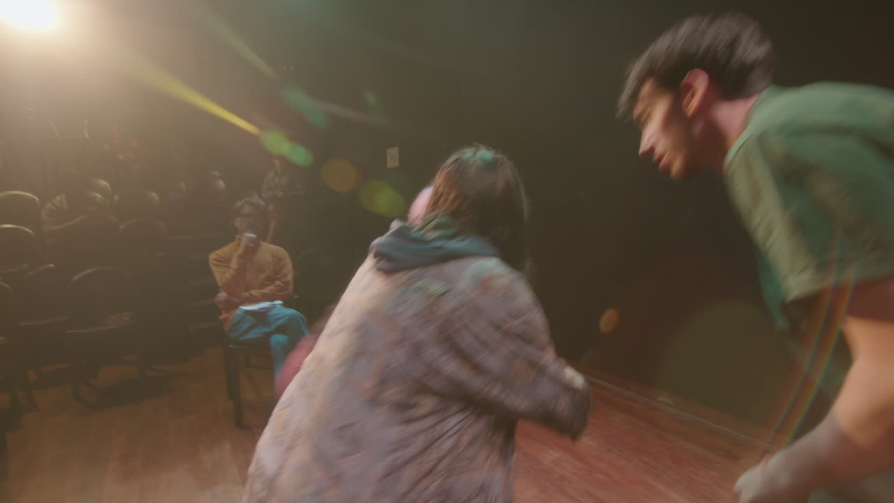 Emotional Actors Playing Drama on Theater Stage during Rehearsal