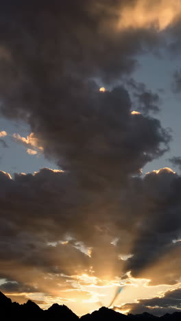 sunset clouds over mountains