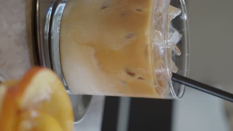 iced coffee with sliced fruit