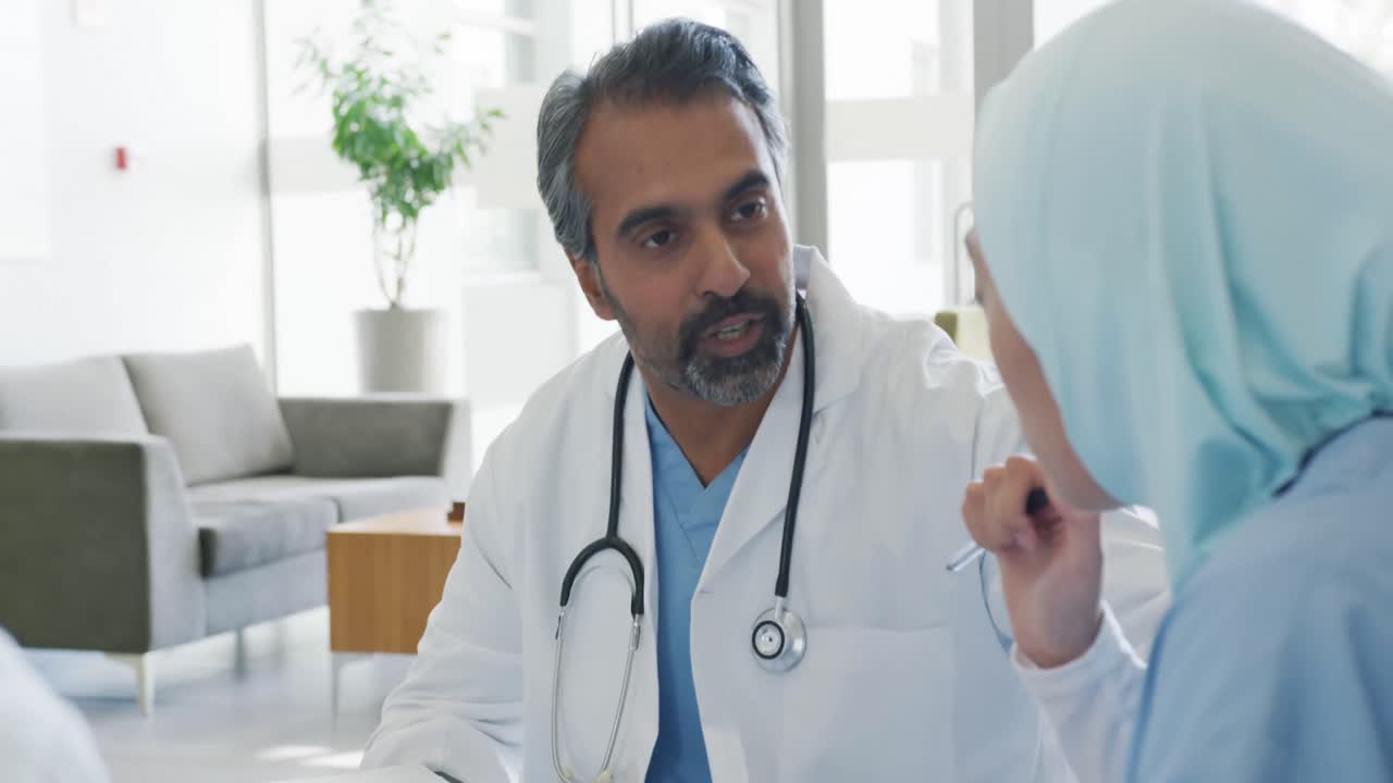 Male doctor and colleagues at a meeting 4k