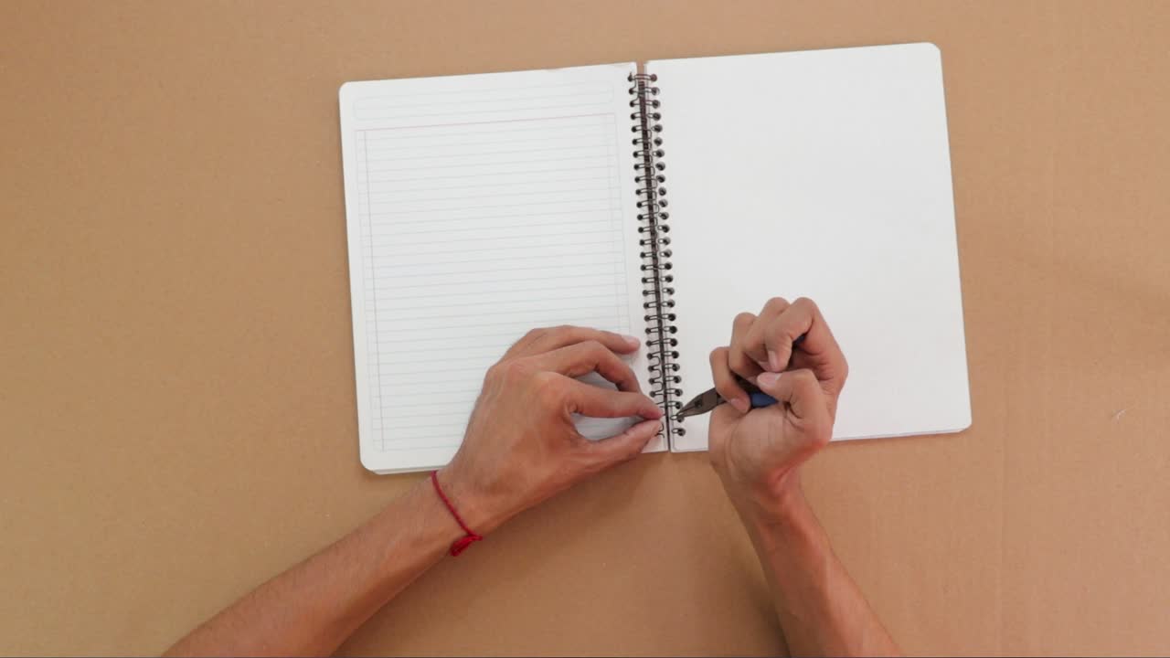 Making a new notebook spiral, handmade paper binding