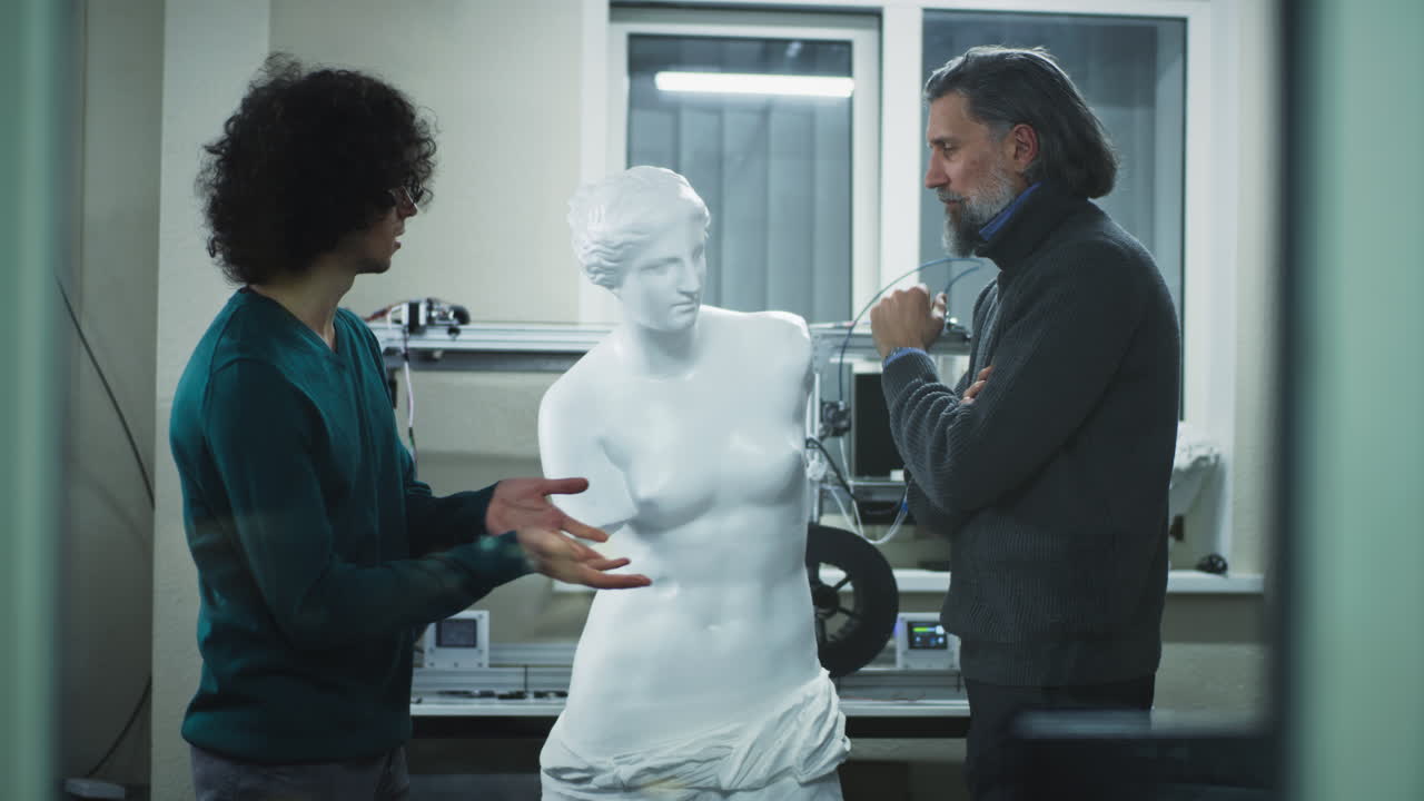 People with a sculpture