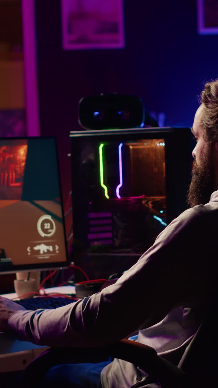 Vertical video Gamer battling flying robots in online singleplayer shooter from neon lights ornate home