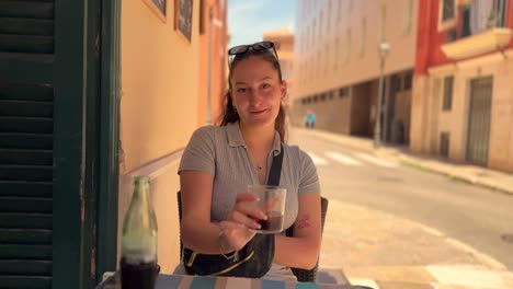 romantic date with beautiful smiling young brunette woman, bar coffee shop