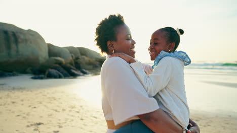 Sunset,-dancing-and-mother-with-child-on-beach