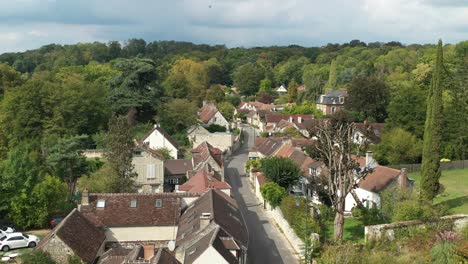 aerial view of traditional french village nestled in lush green landscape, oise, france