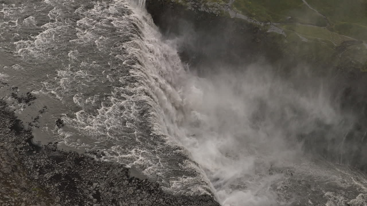 Slow motion over the most powerful waterfall in Iceland aerial shot cloudy day