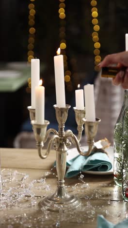 christmas dinner table setting with candles