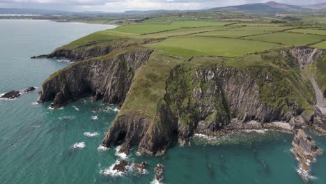 drone shot of large sea cliffs on the irish coastline