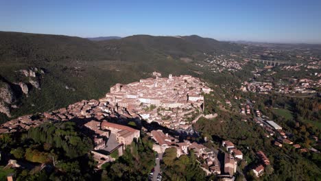 Aerial-panorama-of-medieval-city-Narni-on-top-of-a-green-hill-landscape