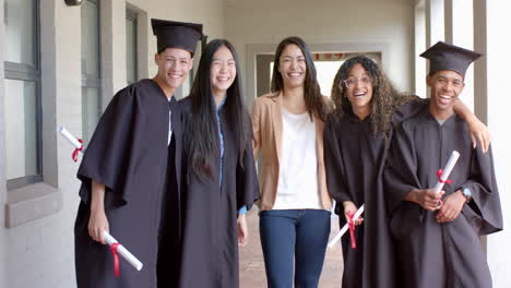 diverse group of graduates celebrate their achievement