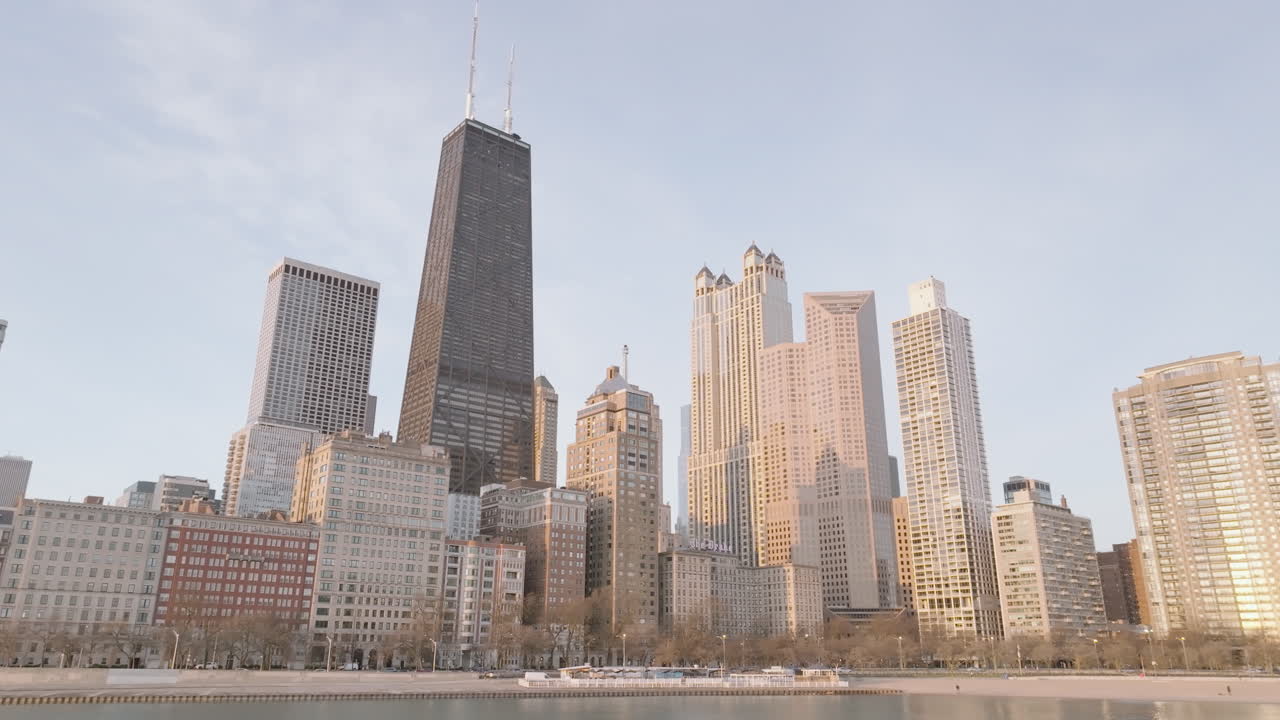 Establishing shot of Chicago at sunrise. Shot on Lake Michigan