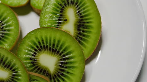 slices of kiwi on a white plate