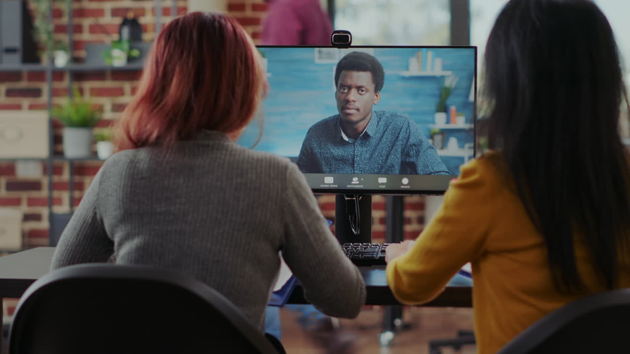 Business employees attending job interview of remote video call