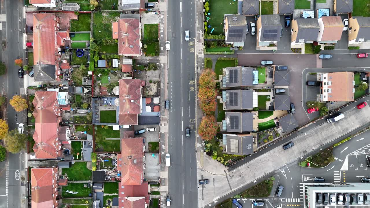 Aerial drone birds eye view of traffics cars vans trucks at the junction intersection sunderland england uk british streets