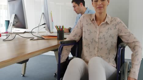 Young-man-and-woman-working-in-a-creative-office