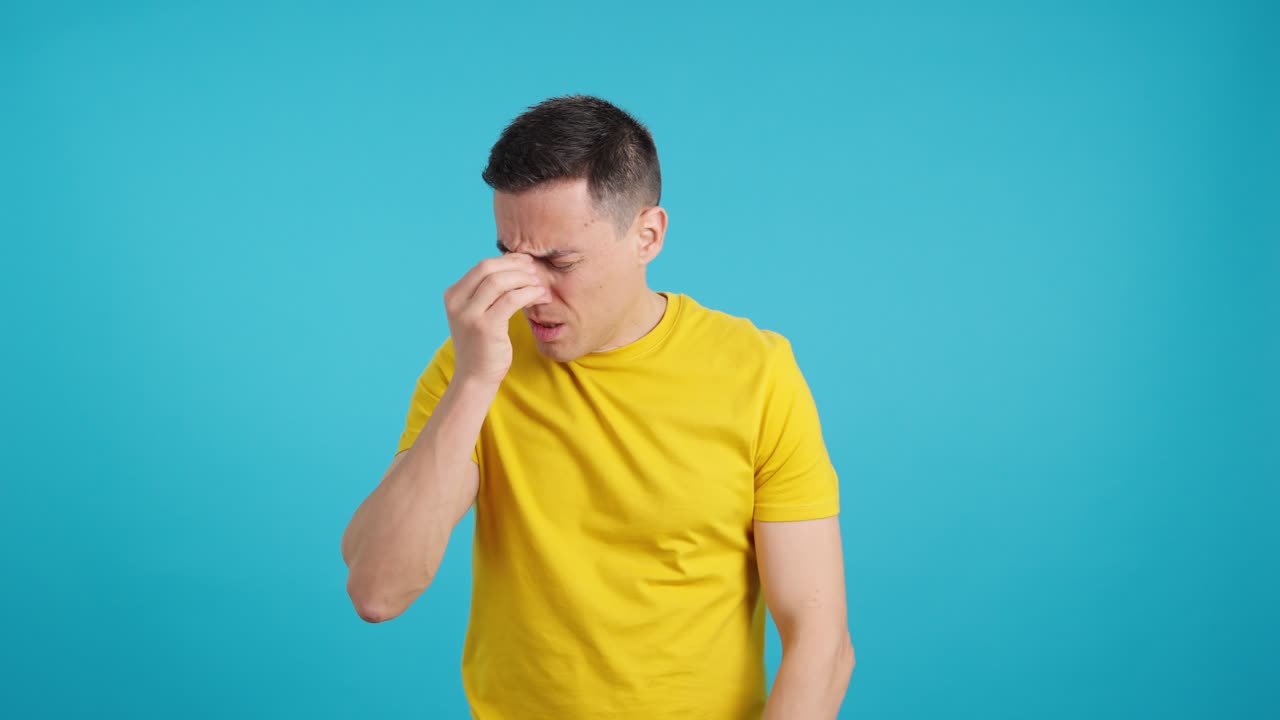 Man expressing pain and stress