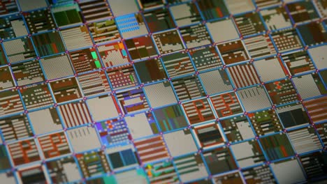 Silicon-semiconductor-wafer-close-up.-In-electronics,-a-wafer-also-called-a-slice-or-substrate-is-a-thin-slice-of-semiconductor,-a-crystalline-silicon,-used-for-the-fabrication-of-integrated-circuits