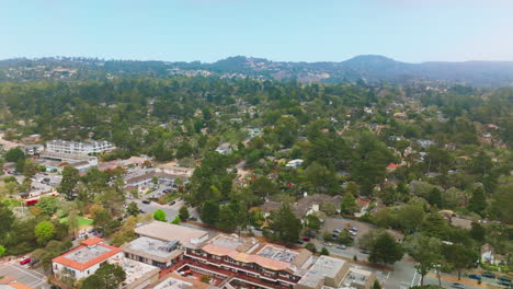 cozy lovely city of carmel-by-the-sea in california. green city panorama with mountains at backdrop. top view.