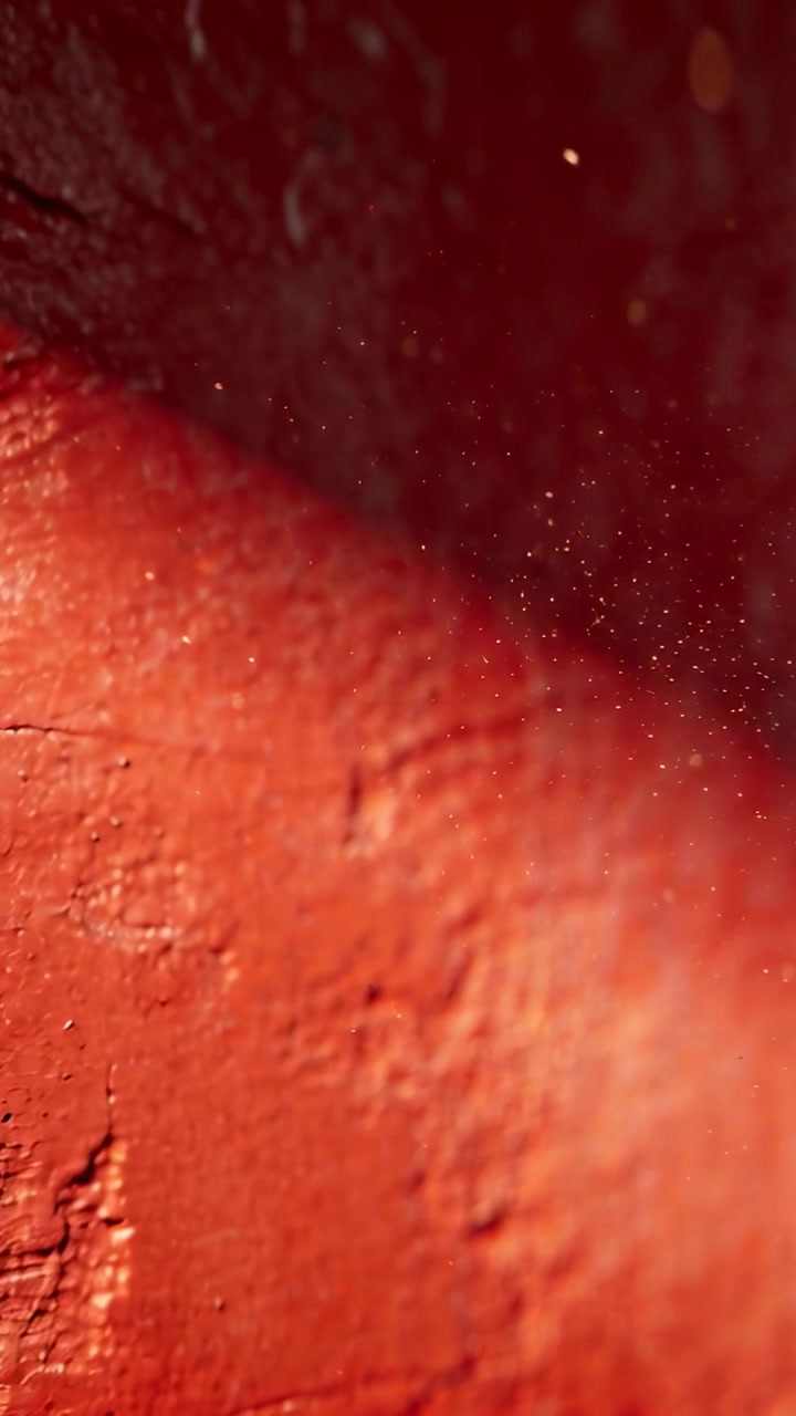 Vertical video: Showing painted plaster wall after focus shift in closeup, dust and hairline crack