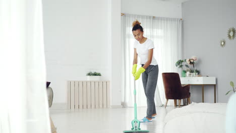 woman cleaning a room