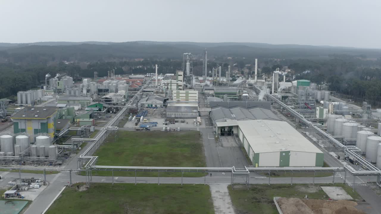 Wide aerial shot of DRT biomass plant in Vielle-Saint-Girons, France. Aerial drone flyback, panoramic view, copy space