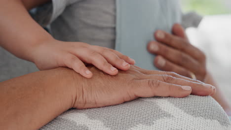 child gently touching grandmothers hand showing compassion for granny enjoying love from granddaughter family support concept unrecognizable people 4k