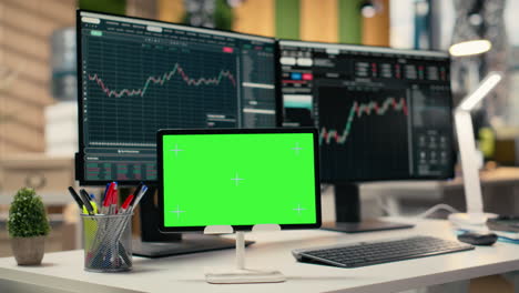 stock market metrics displayed on isolated screen tablet in investment firm