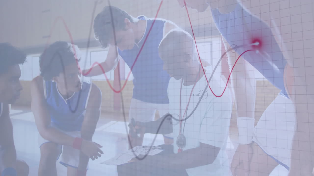 Coach kneeling guiding team in basketball training showing animated play charts and moving lines