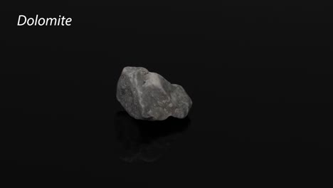 a dolomite rock specimen rotating on a black background.