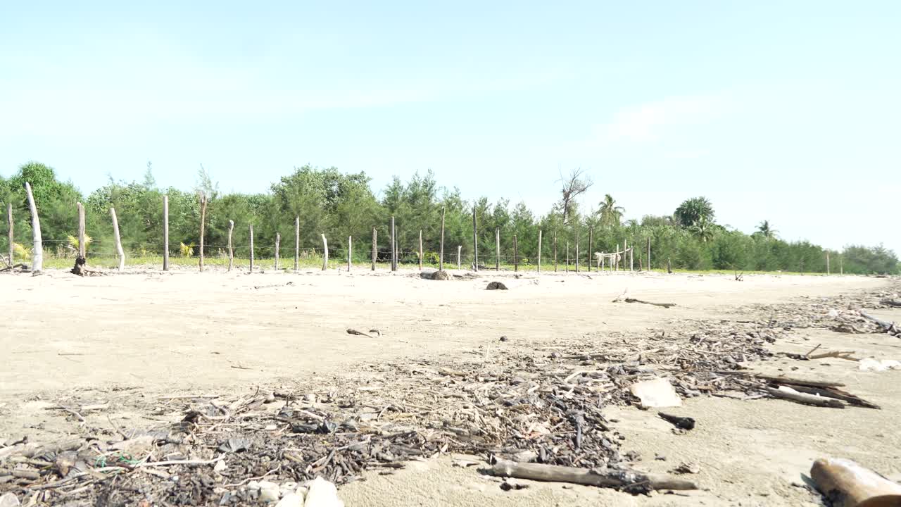 Summer View Of Alit Beach And Fishing Village Kabong,White Sandy Beach,Blue Sea ,Sky And Green Coconut Trees,Sarawak,Borneo.