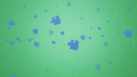 animación de piezas azules del rompecabezas que caen sobre un fondo verde