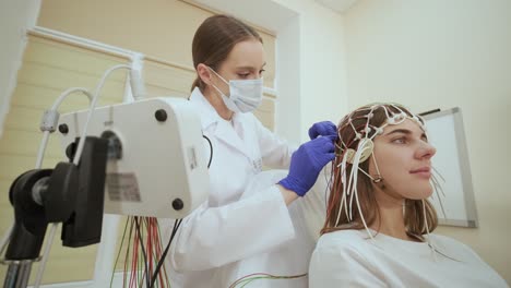 patient brain testing using encephalography at medical center