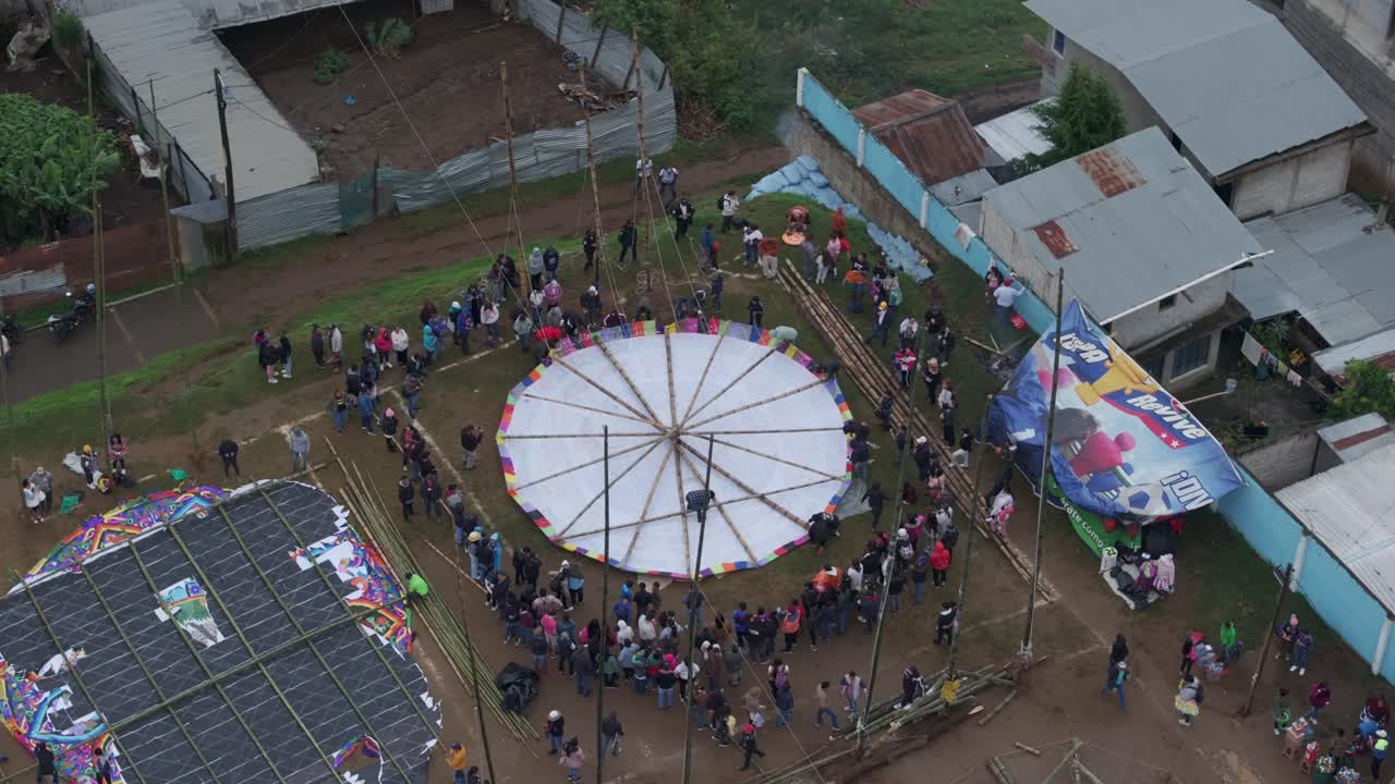 Red kite flying during All Saint's Day In Sumpango, aerial