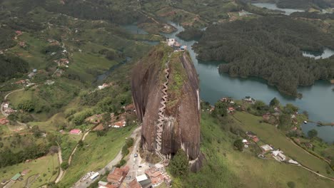 el penol rock or la piedra del penol, is a natural landmark in colombia and attracts many tourists year-round. visitors can climb the 708-step staircase. built into a crack on its surface.