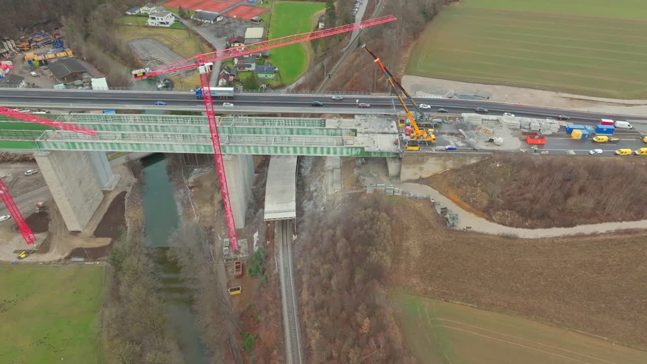 Above View Of Cranes Working On Road Bridge Construction Site