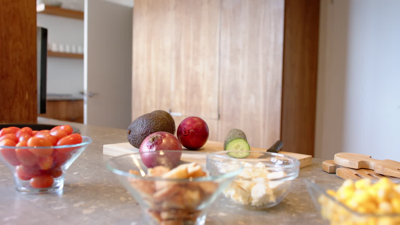 Preparing healthy meal, fresh vegetables and ingredients on kitchen counter, at home, copy space